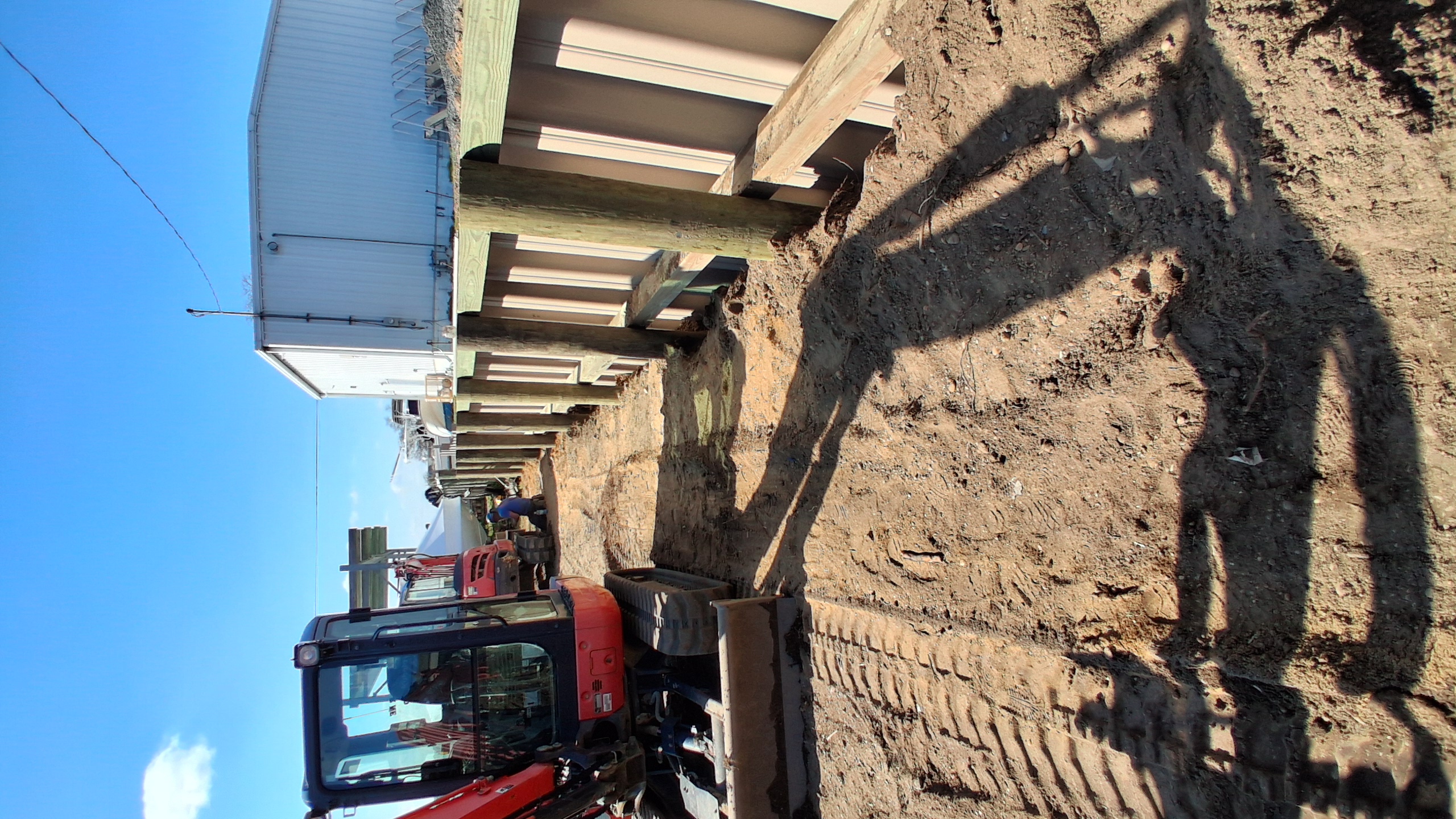 Steel sheet pile bulkhead at boatyard perimeter